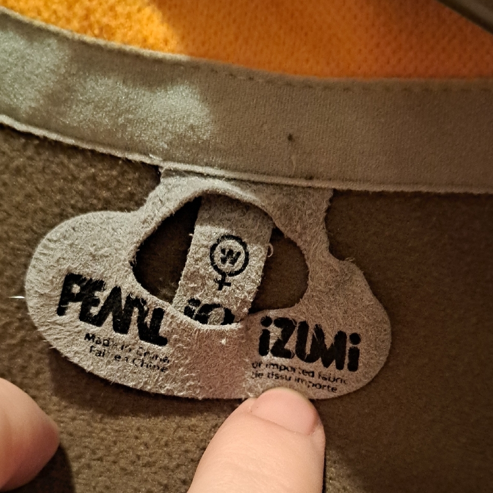 079 - Pearl Izumi Quilted And Fleece Jacket with Orange Trim And Lovely Detail. - Picture 2 of 7